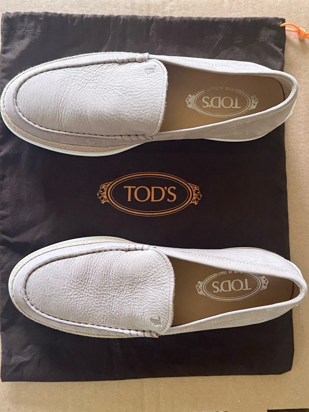 Tod's White Pebbled Leather Slip-On Loafers